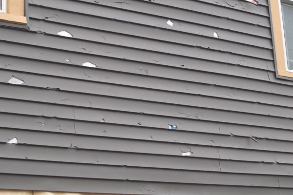 Damaged Siding Replacement in Traverse City