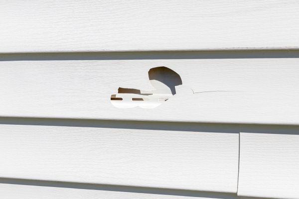 White Vinyl Siding Repair in Traverse City